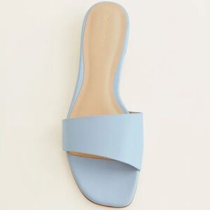 Never worn Reformation Joey Asymmetrical Flat Slide size 9.5